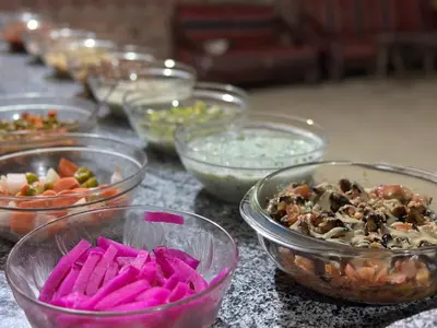 a group of bowls of food on a table at Salameh's Bedouin Camp in Wadi Rum
