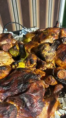 a close up of a meal of meat and vegetables at Sidra Luxury Camp in Rum in Wadi Rum