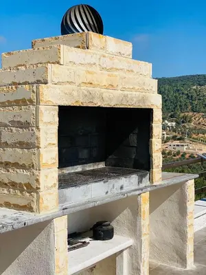 a brick oven sitting on top of a building at Souf view in Jerash