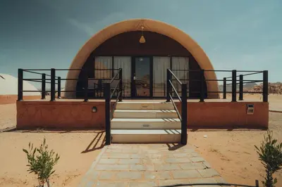 an entrance to a building in the desert at Shell Luxury Camp in Wadi Rum