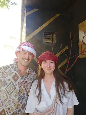 a man and a woman posing for a picture at Petra Musa Rural House in Wadi Musa