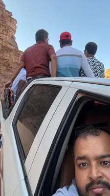 a group of people sitting in the back of a car at Wadi Rum Beyond nature in Wadi Rum