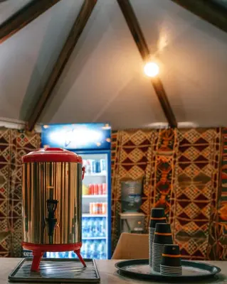 a toaster sitting on a table in a kitchen at Wadi Rum Desert Dunes Luxury Camp in Wadi Rum