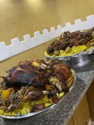 two trays of food on top of a counter at Charlotte luxury camp in Wadi Rum