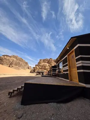 a building in the middle of the desert at Luxury tent camp in Wadi Rum