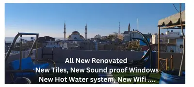 a sign that says new tires new tires new sound root windows new hot water system at Moab Land Hotel in Madaba