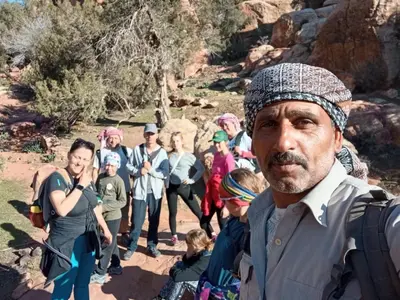 a man standing in front of a group of people at Dana local life Eco Lodge in Dana