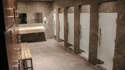 a bathroom with a sink and a mirror at Sandy palace Hotel in Amman