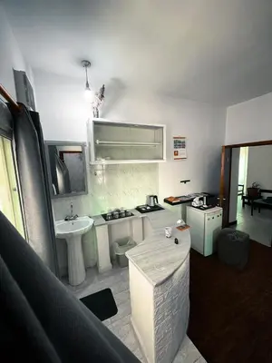 a bathroom with a sink and a toilet and a sink at Value Place in Wadi Musa