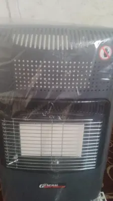 a front view of a toaster oven with its hood at Dana Star lodge in Dana