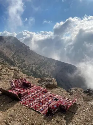 a group of tables on top of a mountain at Dana Star lodge in Dana