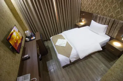 an overhead view of a hotel room with a bed at Beirut Hotel 2 in Amman