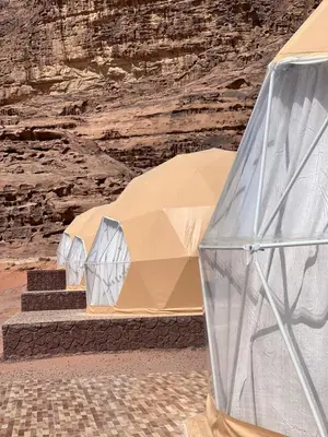 a tent in the middle of a canyon at Nada luxury camp in Wadi Rum