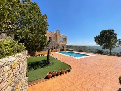 a house with a swimming pool in a yard at Horizon 2 Cozy Villa in Amman