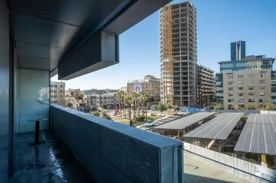 a view of a city from the balcony of a building at Boulevard, Abdali Luxury 1 BR Apartment in Amman