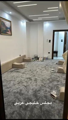 a large room with couches in the middle of it at شقة بثلاث غرف نوم 3 عمو سامي in Amman