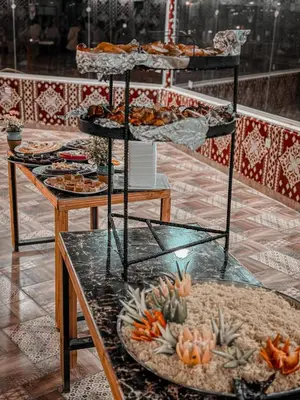 a display of plates of food on a table at Romantic Moment Rum CAMP in Wadi Rum