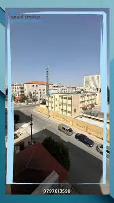 a view from a window of a city street at Tlaa al ali amman 3 rooms furnished apartment المحكمة الدستورية in Umm Uthainah