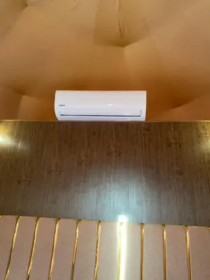 a air conditioner sitting on top of a ceiling at Camp safaa rum in Wadi Rum
