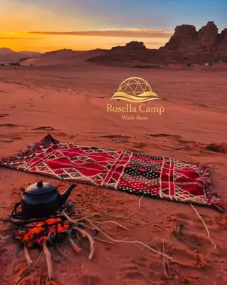 a pot sitting on top of a rug on the desert at Rosella Camp Wadi Rum in Wadi Rum