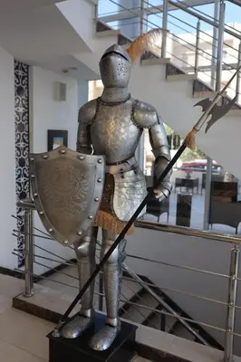 a statue of a knight holding a shield at Hotel Rayshan in Amman
