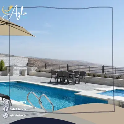 a rendering of a swimming pool with tables and chairs at Ayla Chalets in Amman