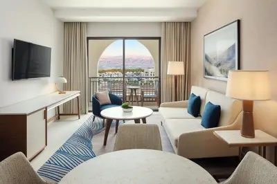 a living room with a couch and a table at The Westin Saraya Aqaba Resort & Spa in Aqaba