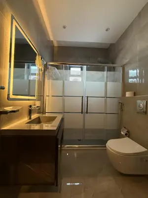 a bathroom with a toilet and a sink at North paradise hotel in Irbid