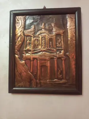 a painting of a building on a wall at luxury house in Madaba