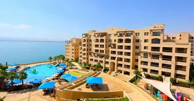 an aerial view of a resort with a swimming pool at B35 Samarah Resort LOFT apartment in Sowayma