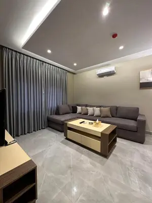 a living room with a couch and a coffee table at Chic Apartments For Rent ave2-5 in Amman