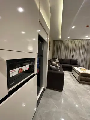a living room with a couch and a fireplace at Chic Apartments For Rent ave2-7 in Amman