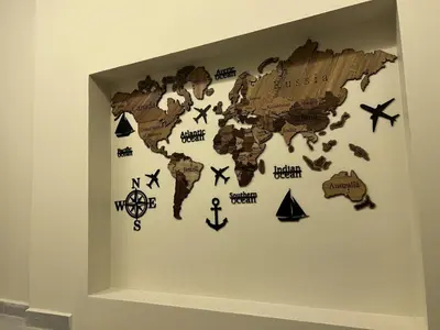 a map of the world on a wall at Jawad Hotel by Sandra in Amman