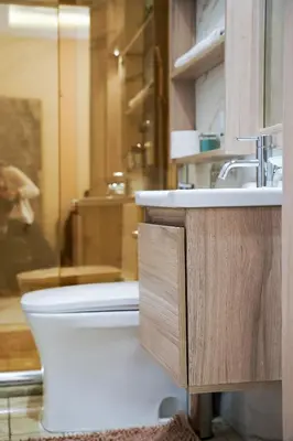 a bathroom with a toilet and a sink at Hawari Group in Umm Uthainah