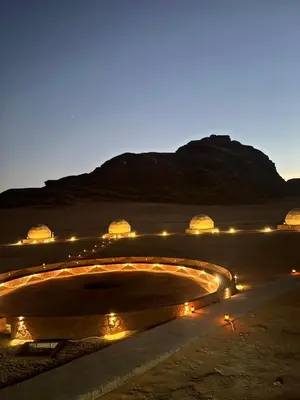 a night view of a amphitheater with lights at Bright Stars Camp in Disah