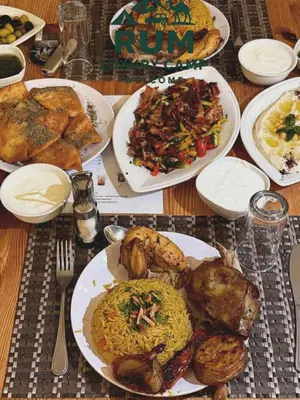 a table with plates of food on it at RUM LUXURY CAMp in Wadi Rum