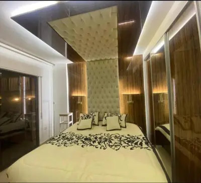 a bedroom with a large bed in a room at الأردن عمان ضاحية الأمير راشد شارع مكه in Umm Uthainah