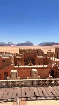 an ancient building in the middle of the desert at rum luxury camp in Wadi Rum