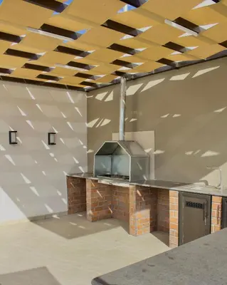 a kitchen with a stove in a building at Florya Villa by Seahorse in Amman