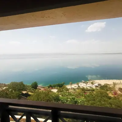 a view of the ocean from a balcony at E23 Luxury - Full Sea view-Samra Resort in Sowayma
