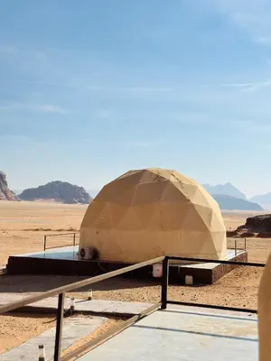 an airplane sitting in the middle of the desert at Welcome to Wadi Rum in Wadi Rum