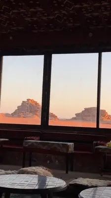 a view of the desert from a window at Desert Magic Camp in Wadi Rum