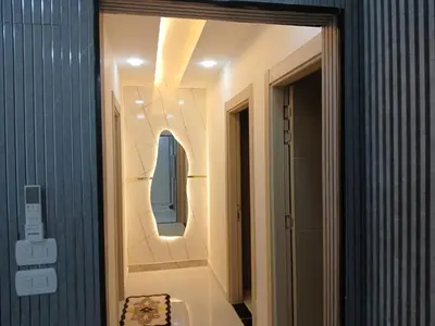 a bathroom with a mirror and a sink at شقق السعادة 1 in Amman