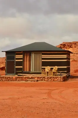 a house in the middle of the desert at Wadi rum camp with tour in Wadi Rum