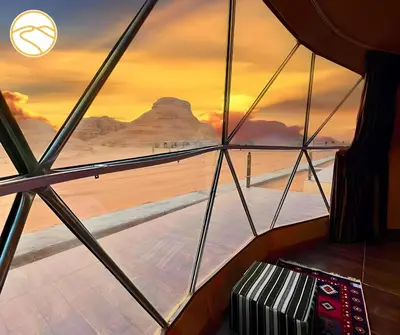 a view from the inside of a boat with a window at Amber Luxury Camp in Maḩaţţat Dīsah