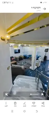 a view of a living room with a couch and chairs at اربد طريق البترول دبج مول فيلا مزرعة مفروشة للايجار يومي أسبوعي شهري in Juḩfīyah