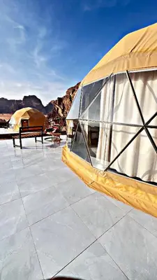 a group of tents sitting on top of a roof at CAPITAL RUM lUXURY CAMP in Wadi Rum