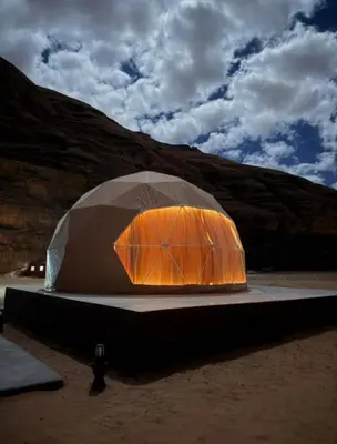 a tent in the middle of a desert at Rum STAR LUXURY Camp &JEEP Tours in Wadi Rum