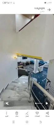 a picture of a staircase in a room at فيلا اربد طريق البترول in Juḩfīyah