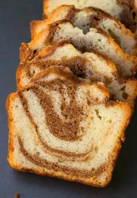 a close up of a slice of bread on a table at Rawabi INN in Maţār al Malik Ḩusayn